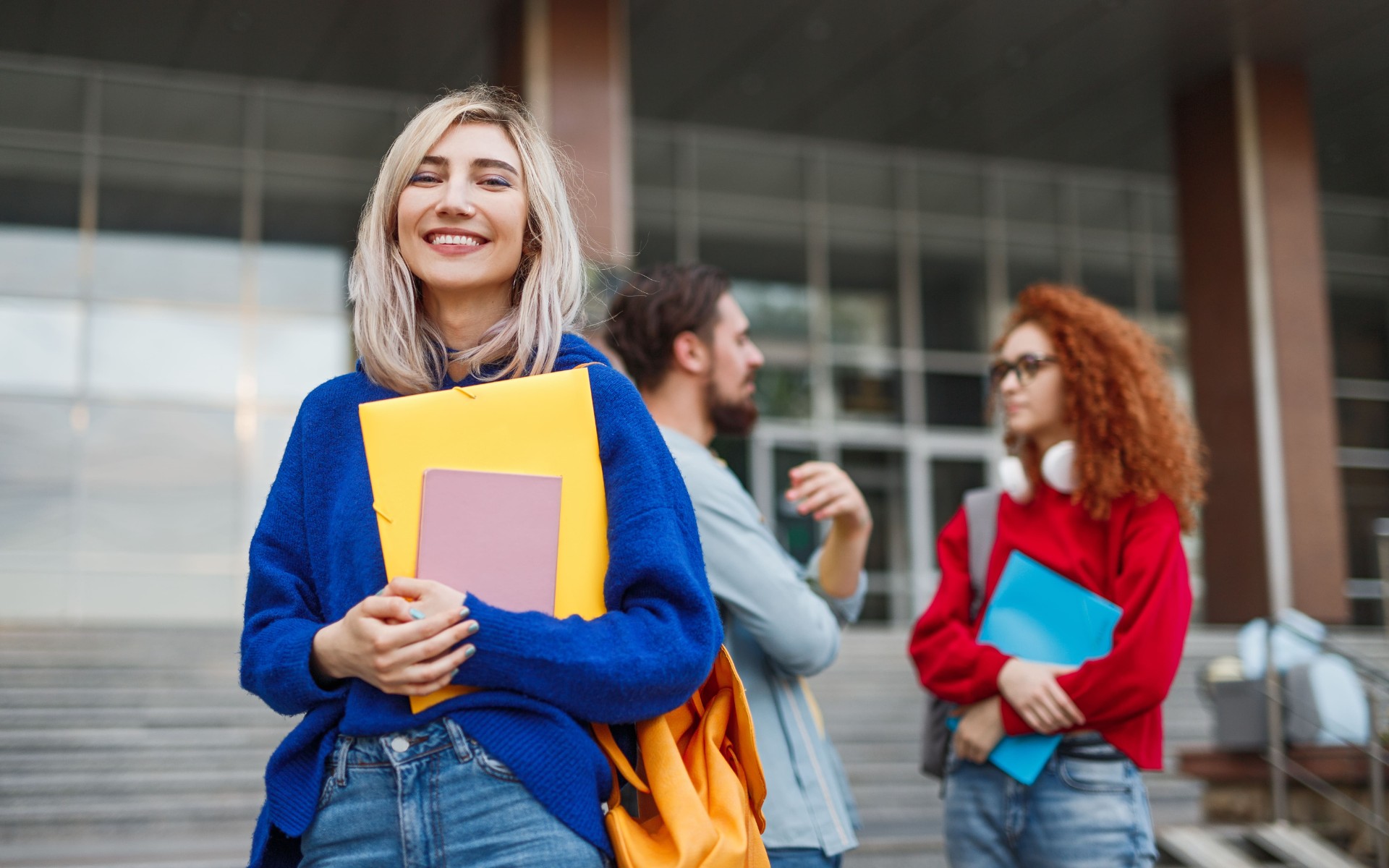 cheerful-young-woman-applying-to-university-2023-11-27-05-07-01-utc-min.jpg