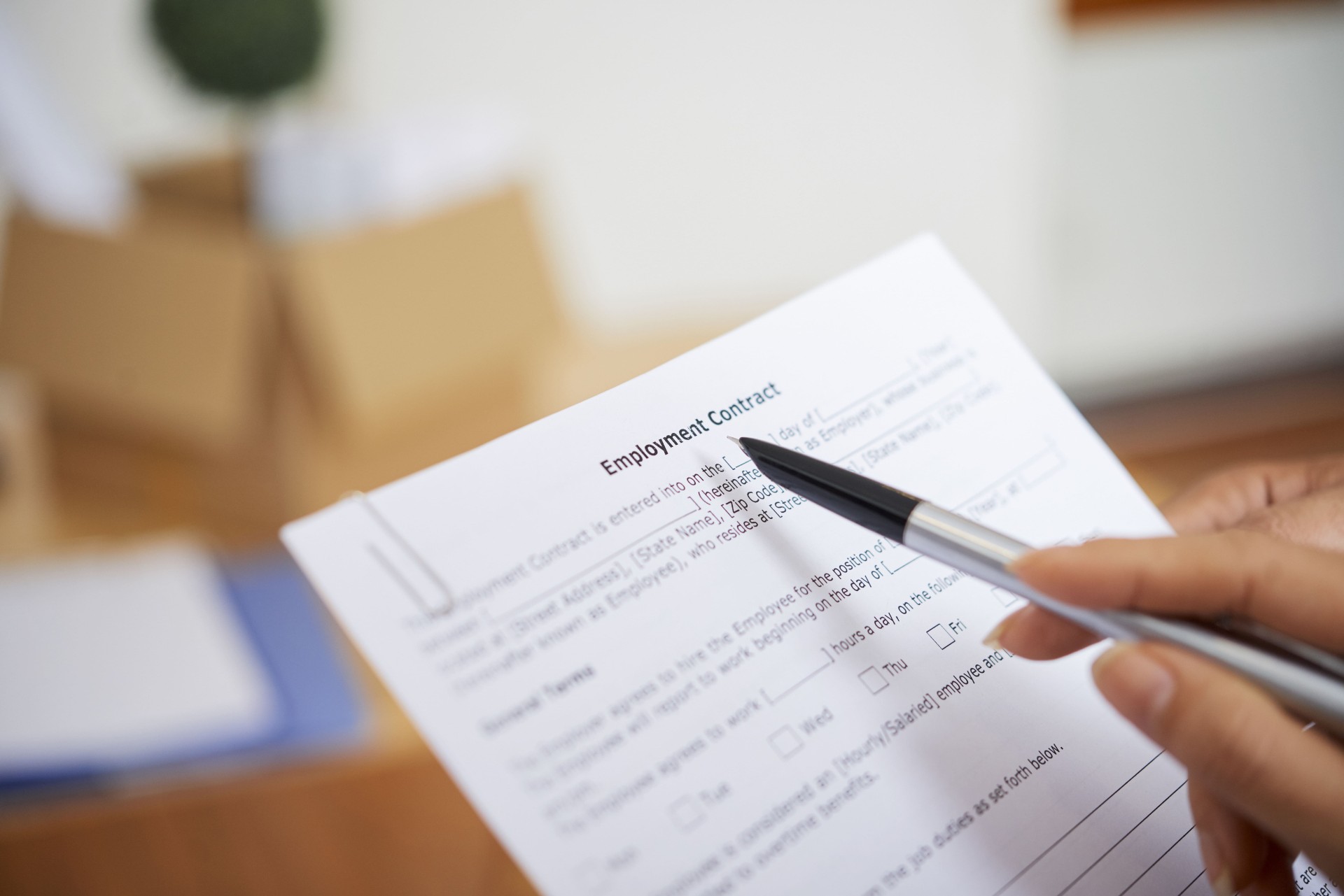 business-lady-checking-employment-contract-2023-11-27-05-07-36-utc-min.jpg