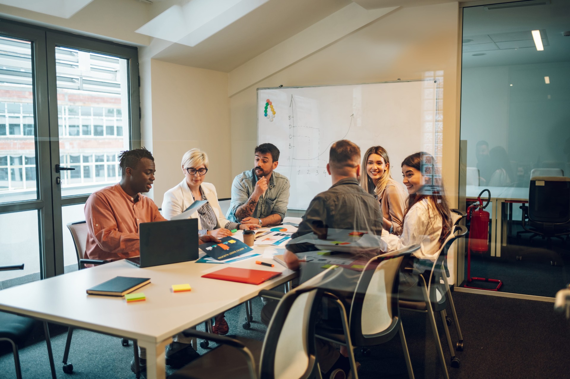 multiracial-business-team-having-a-meeting-in-the-2023-11-27-04-52-53-utc-min.jpg